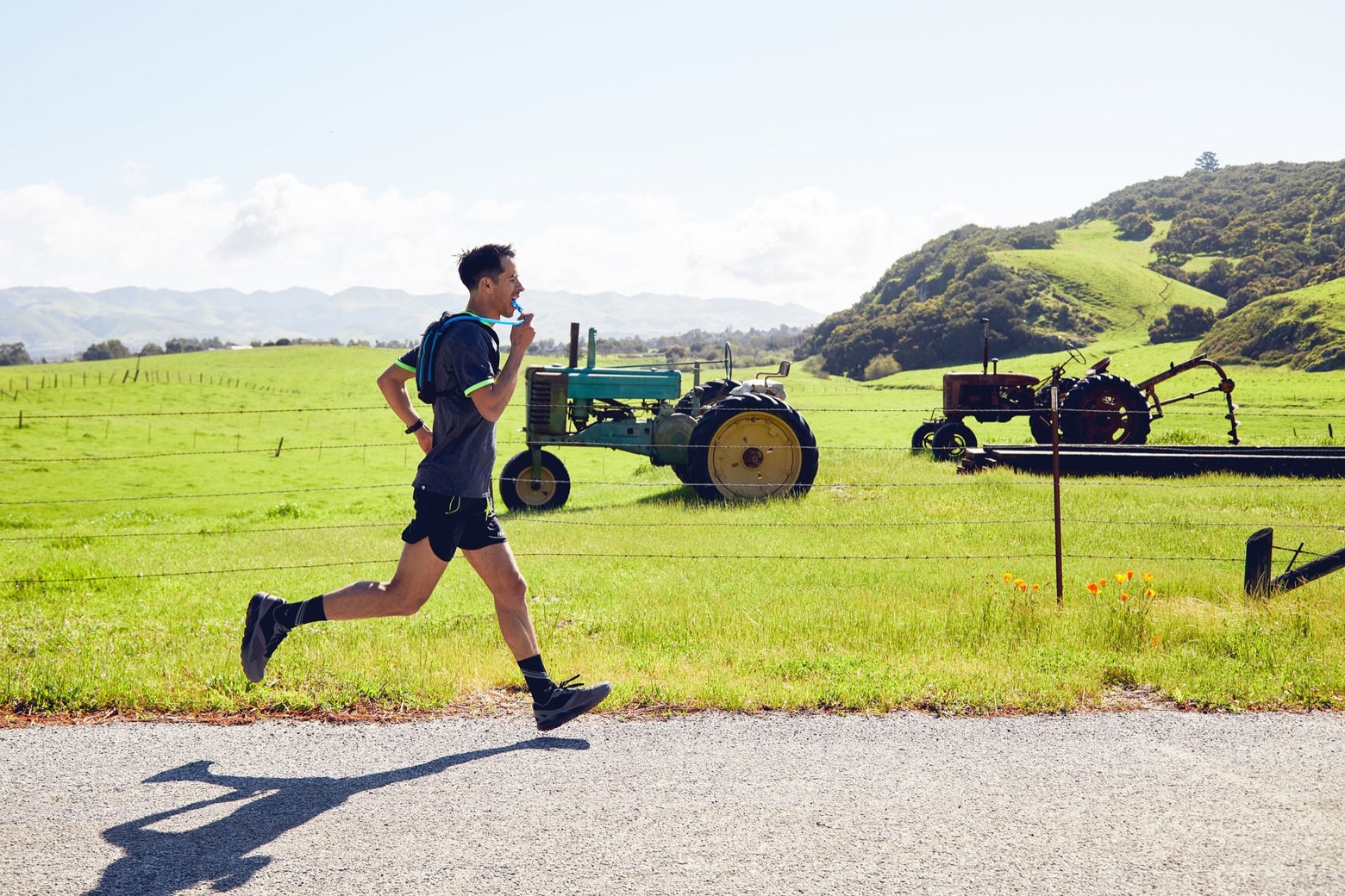 Man running with a hydration vest